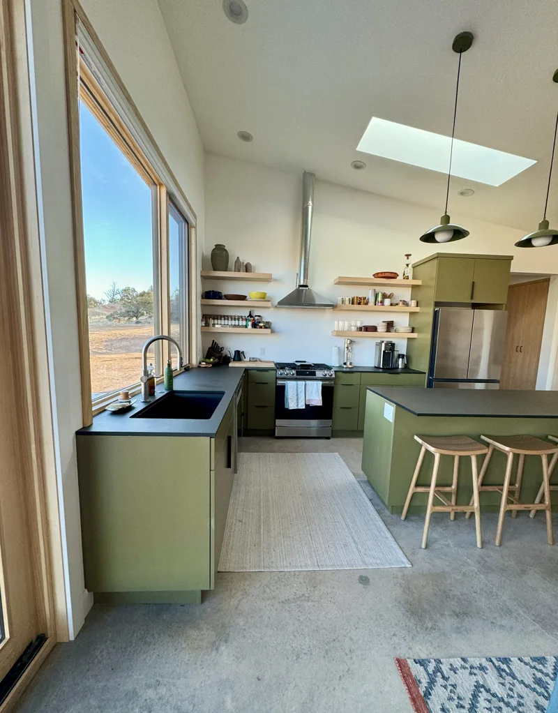 Olive green modern kitchen — custom cabinetry by Cozzens Cabinets, photo 1