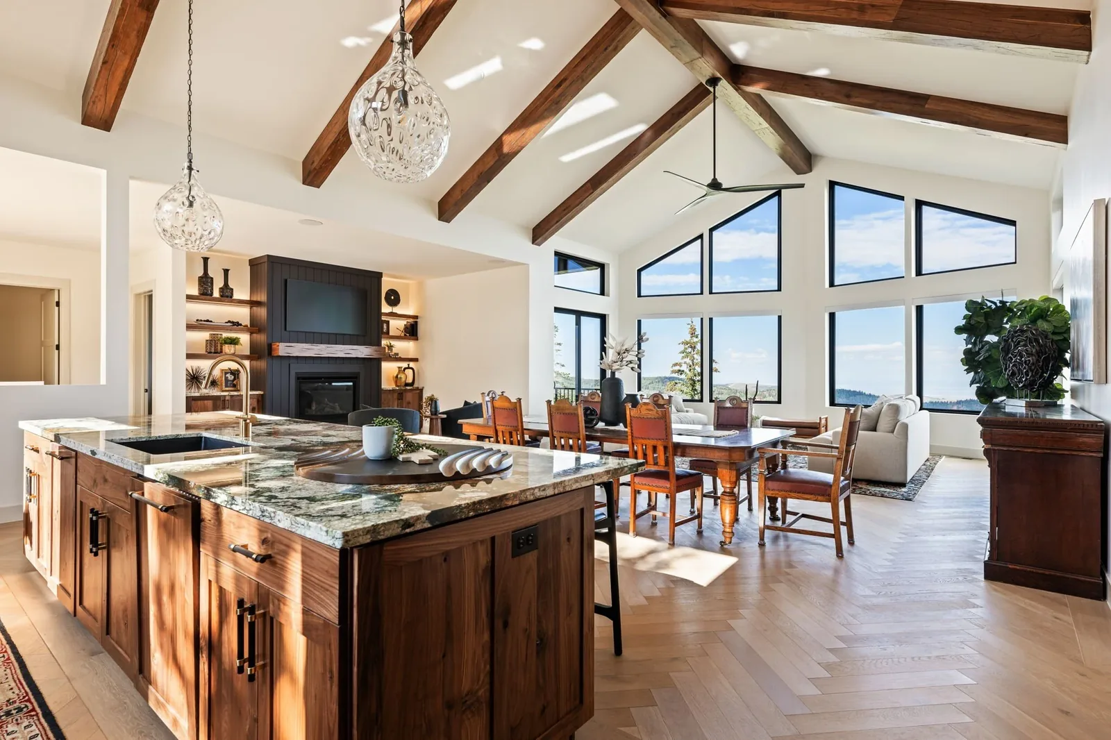 Great room with exposed beams and custom walnut kitchen island
